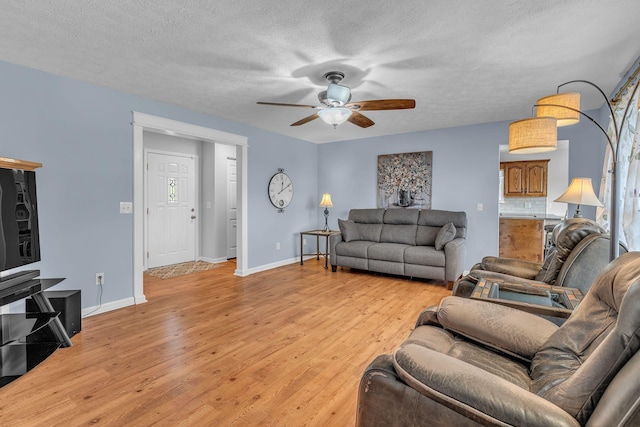211 Northview Ct, Hendersonville, TN 37075 - living area featuring a ceiling fan, light wood-type flooring, a textured ceiling, and baseboards