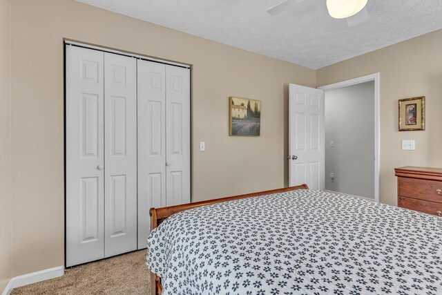 211 Northview Ct, Hendersonville, TN 37075 - bedroom featuring light carpet, a closet, a ceiling fan, a textured ceiling, and baseboards