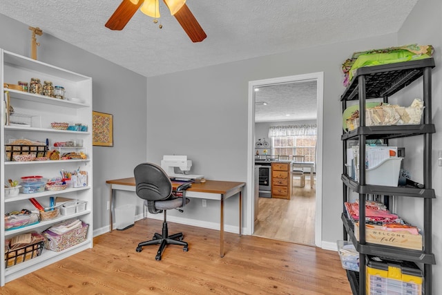 211 Northview Ct, Hendersonville, TN 37075 - office space with a textured ceiling, light wood-type flooring, a ceiling fan, and baseboards