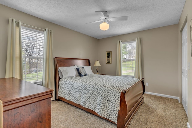 211 Northview Ct, Hendersonville, TN 37075 - bedroom featuring light colored carpet, ceiling fan, a textured ceiling, and baseboards