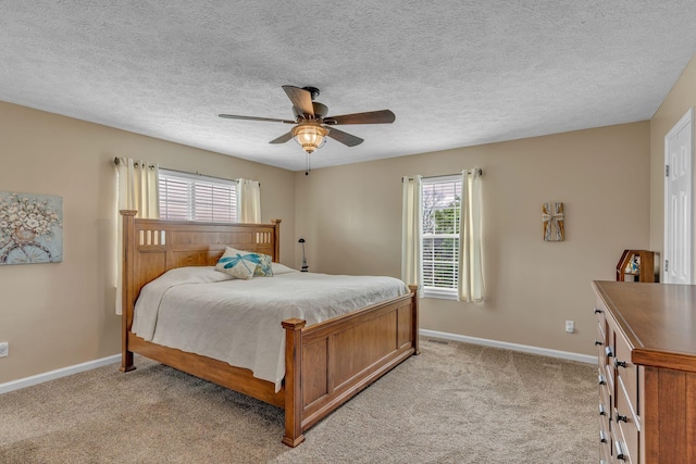 211 Northview Ct, Hendersonville, TN 37075 - bedroom featuring light carpet, baseboards, ceiling fan, and a textured ceiling