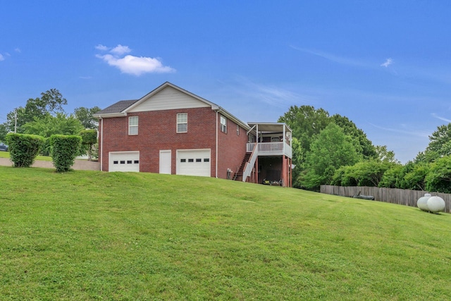 211 Northview Ct, Hendersonville, TN 37075 - rear view of property with stairs, an attached garage, and brick siding