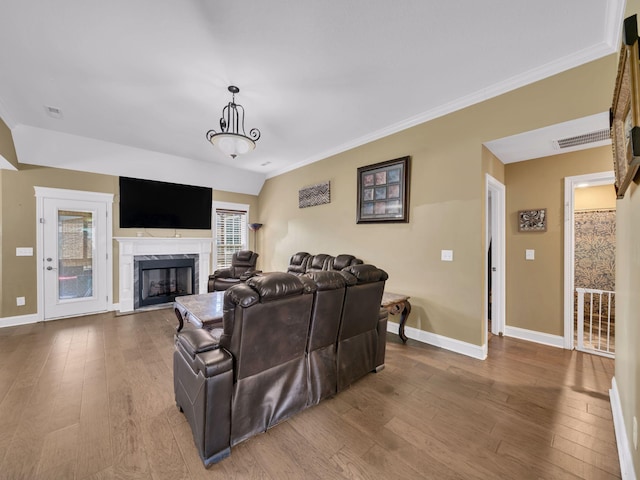 1084 Harrison Way, Clarksville, TN 37042 - living area with a fireplace, wood finished floors, baseboards, and ornamental molding