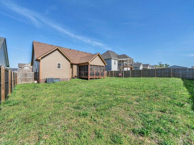 1084 Harrison Way, Clarksville, TN 37042 - view of yard with a fenced backyard, a sunroom, and central air condition unit