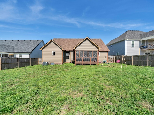 1084 Harrison Way, Clarksville, TN 37042 - rear view of property with a lawn, central AC unit, a sunroom, and a fenced backyard