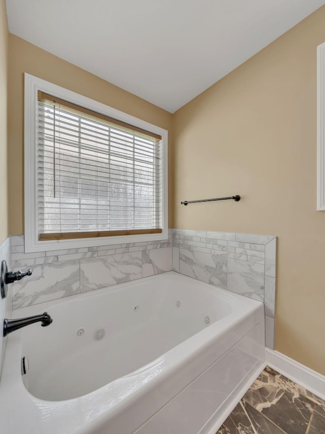 1084 Harrison Way, Clarksville, TN 37042 - full bath with marble finish floor, baseboards, and a tub with jets