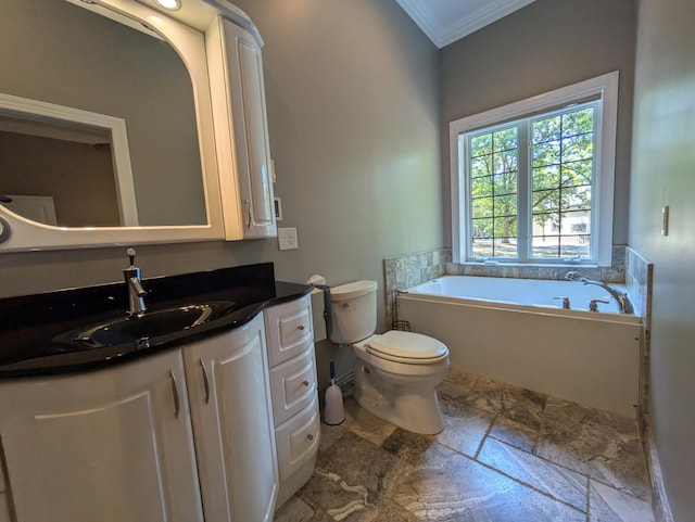 bathroom featuring vanity, crown molding, toilet, stone tile flooring, and a bath
