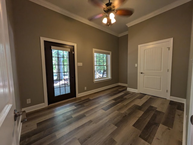 interior space featuring ceiling fan, baseboards, ornamental molding, and wood finished floors