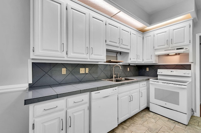 kitchen with white appliances, open shelves, under cabinet range hood, a sink, and tile counters