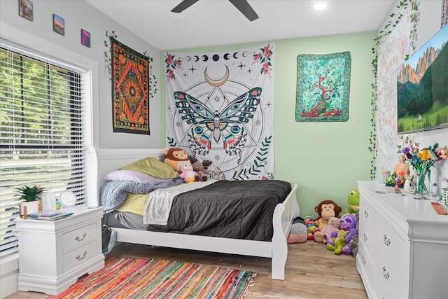 bedroom featuring light wood-style flooring, recessed lighting, and ceiling fan