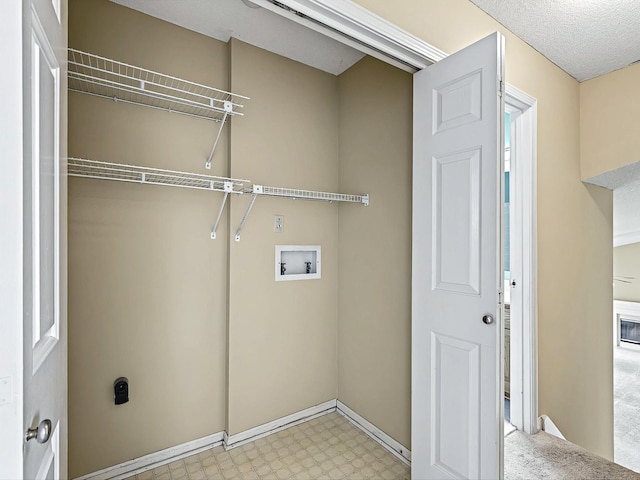 laundry room featuring electric dryer hookup, laundry area, hookup for a washing machine, and light floors