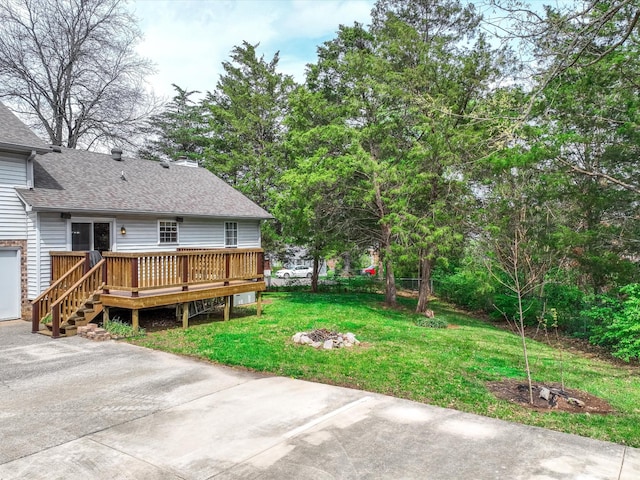 view of yard featuring a deck