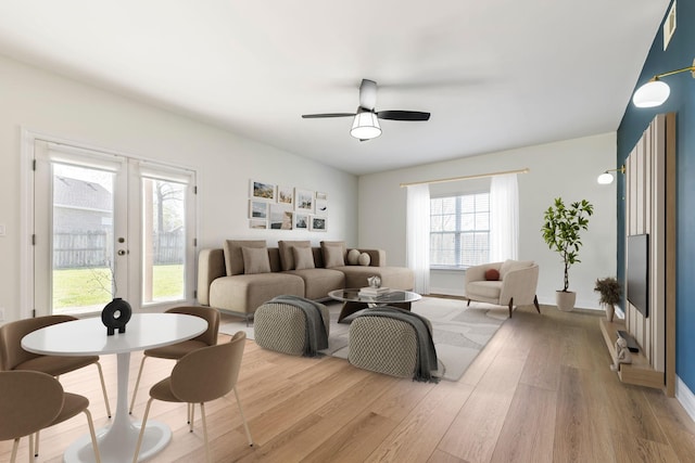 305 Astor Way, Franklin, TN 37064 - living area with baseboards, a ceiling fan, and light wood-style floors