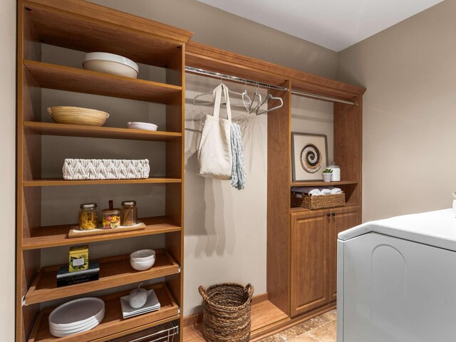washroom with washer / dryer and laundry area