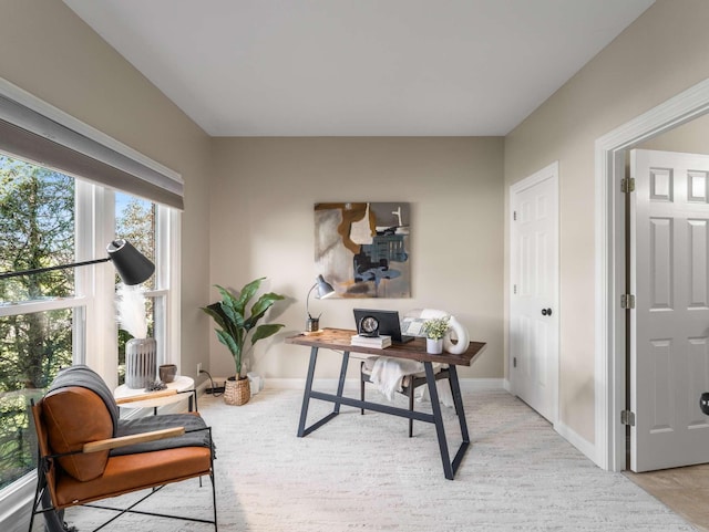 home office featuring baseboards