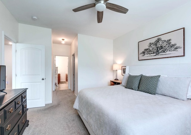 627 Prominence Rd, Columbia, TN 38401 - bedroom featuring light carpet, a ceiling fan, connected bathroom, and baseboards