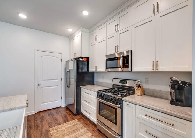 627 Prominence Rd, Columbia, TN 38401 - kitchen featuring stainless steel appliances, dark wood-type flooring, white cabinetry, light stone countertops, and recessed lighting
