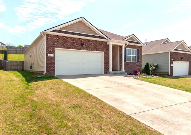 627 Prominence Rd, Columbia, TN 38401 - view of front of property with driveway, a garage, and brick siding
