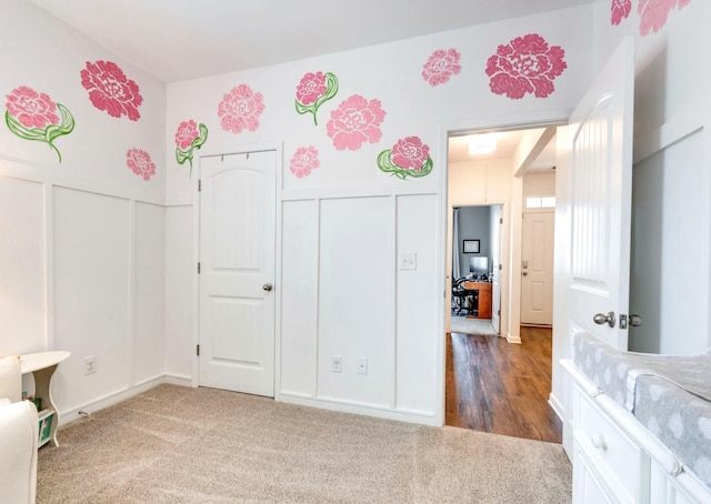627 Prominence Rd, Columbia, TN 38401 - unfurnished bedroom with carpet floors, a decorative wall, and wainscoting