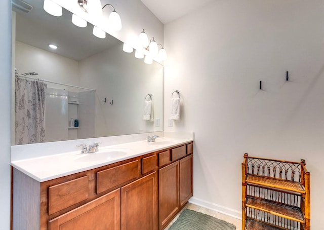 627 Prominence Rd, Columbia, TN 38401 - bathroom featuring baseboards, tile patterned floors, double vanity, and a shower with shower curtain