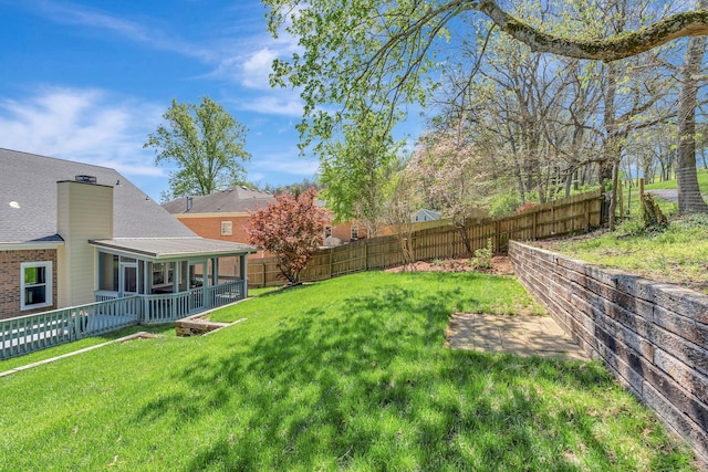 view of yard with a fenced backyard