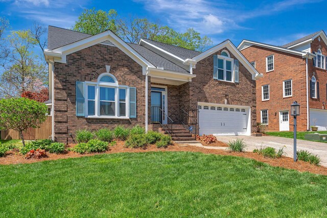 view of front of home featuring a garage, a front lawn, brick siding, a shingled roof, and driveway
