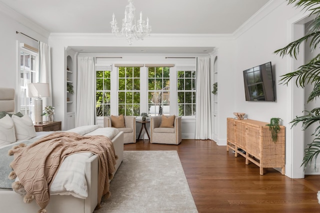 bedroom featuring a chandelier, multiple windows, and ornamental molding
