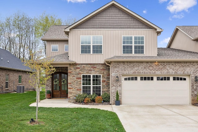 1060 Veridian Dr Unit 23A, Clarksville, TN 37043 - craftsman house with driveway, french doors, board and batten siding, a front lawn, and central AC