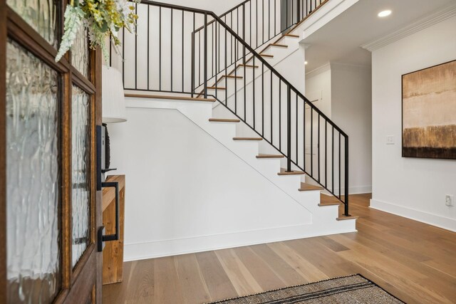 1060 Veridian Dr Unit 23A, Clarksville, TN 37043 - staircase featuring recessed lighting, baseboards, crown molding, and wood finished floors