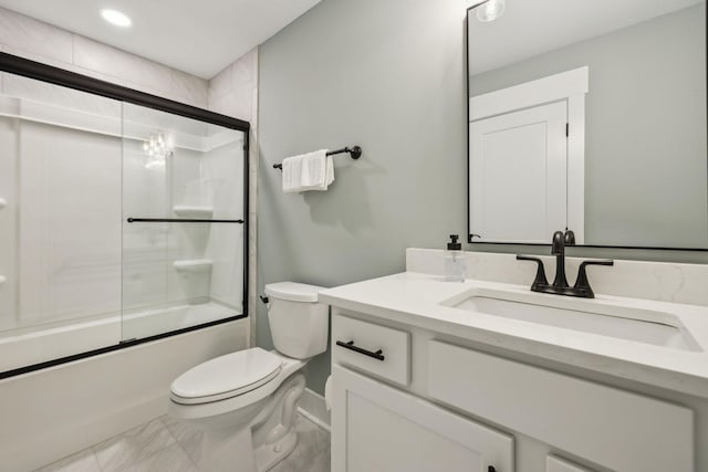 1060 Veridian Dr Unit 23A, Clarksville, TN 37043 - bathroom featuring vanity, toilet, marble finish floor, bath / shower combo with glass door, and baseboards