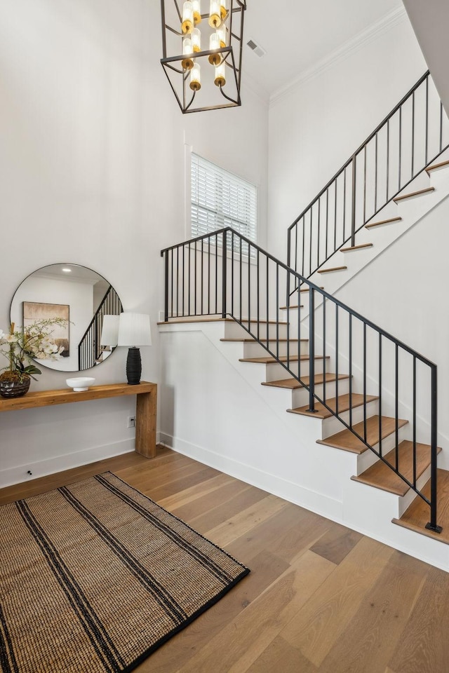 1060 Veridian Dr Unit 23A, Clarksville, TN 37043 - stairs with visible vents, baseboards, a chandelier, and wood finished floors