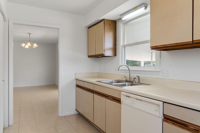 kitchen with a chandelier, light tile patterned flooring, light countertops, a sink, and white dishwasher
