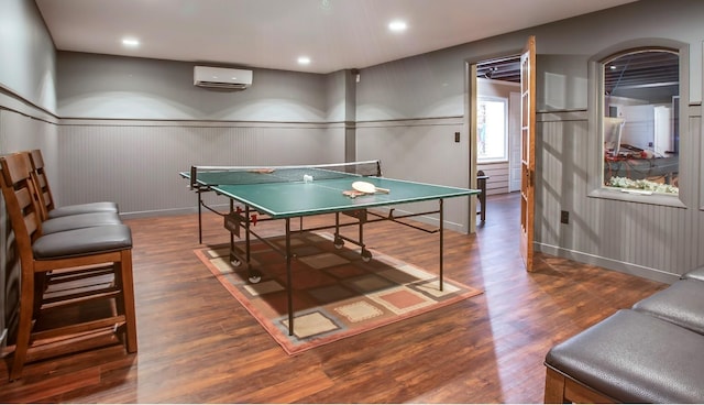 1824 Stryker Pl, Brentwood, TN 37027 - playroom featuring wood finished floors, baseboards, a wall mounted air conditioner, recessed lighting, and a wainscoted wall