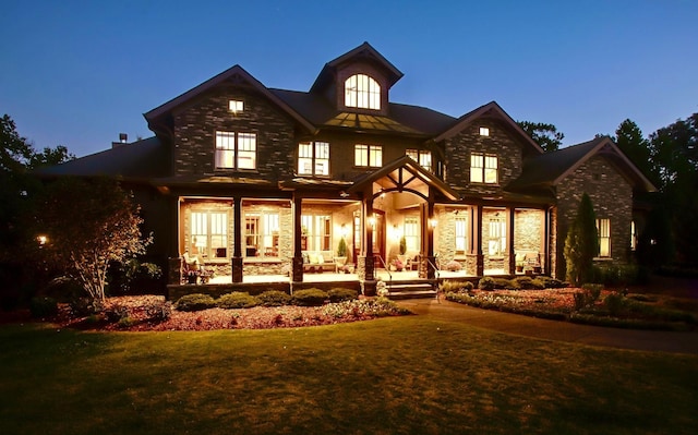 1824 Stryker Pl, Brentwood, TN 37027 - back of property with a lawn, covered porch, and stone siding