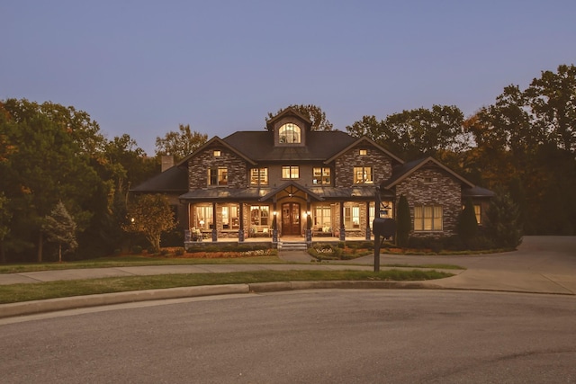 1824 Stryker Pl, Brentwood, TN 37027 - french country inspired facade featuring a chimney, a porch, driveway, and stone siding