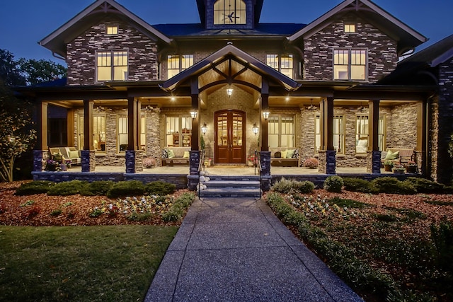 1824 Stryker Pl, Brentwood, TN 37027 - doorway to property featuring a lawn, covered porch, and stone siding