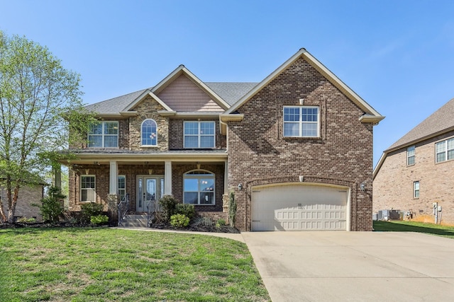 3511 Smith Brothers Ln, Clarksville, TN 37043 - craftsman inspired home with concrete driveway, brick siding, a front lawn, and an attached garage