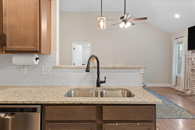 2229 Allen Griffey Rd, Clarksville, TN 37042 - kitchen featuring ceiling fan, tasteful backsplash, vaulted ceiling, dishwasher, and a sink