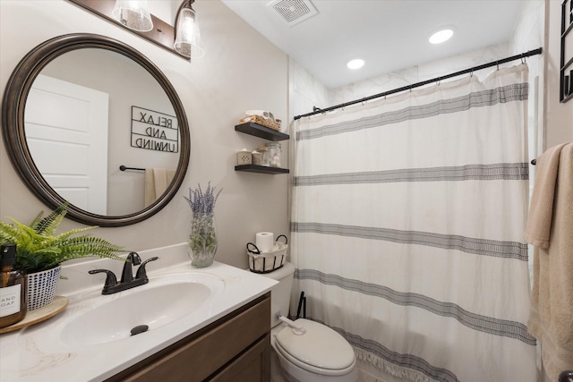 2229 Allen Griffey Rd, Clarksville, TN 37042 - bathroom featuring toilet, a shower with curtain, visible vents, and vanity
