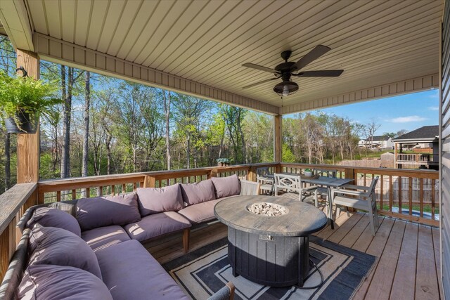 2229 Allen Griffey Rd, Clarksville, TN 37042 - wooden deck with an outdoor hangout area, a ceiling fan, and outdoor dining area