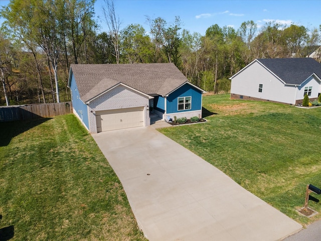 2229 Allen Griffey Rd, Clarksville, TN 37042 - view of front of property featuring fence, a front yard, board and batten siding, concrete driveway, and an attached garage