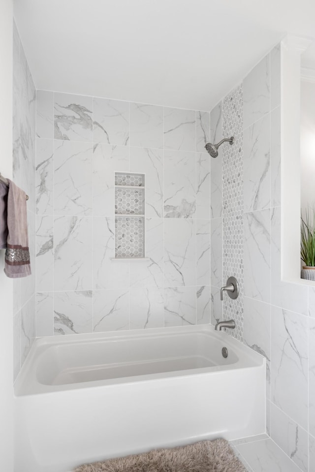 bathroom with shower / bath combination