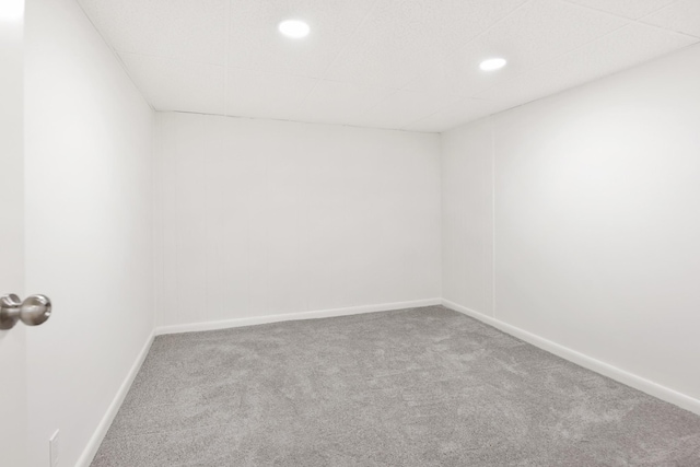 carpeted empty room with recessed lighting and baseboards