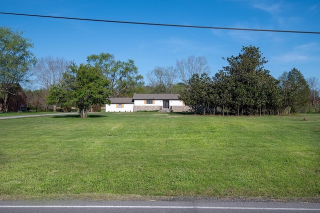 view of front of home with a front yard
