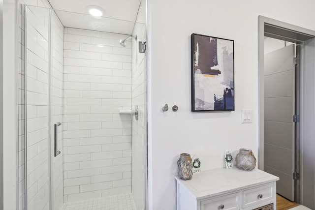 bathroom featuring a stall shower