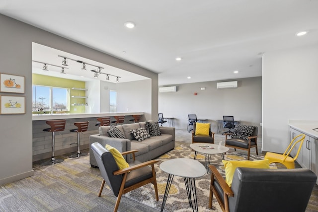 living room featuring recessed lighting, carpet flooring, and an AC wall unit