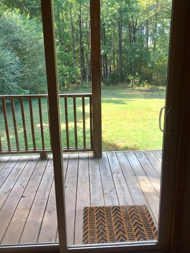 5735 Railroad St, Williston, TN 38076 - doorway featuring wood-type flooring