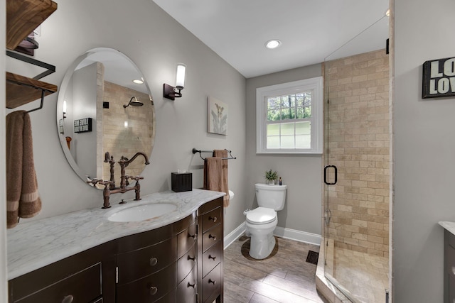6112 Frontier Ct, Nashville, TN 37211 - full bath featuring toilet, vanity, wood finished floors, and a stall shower