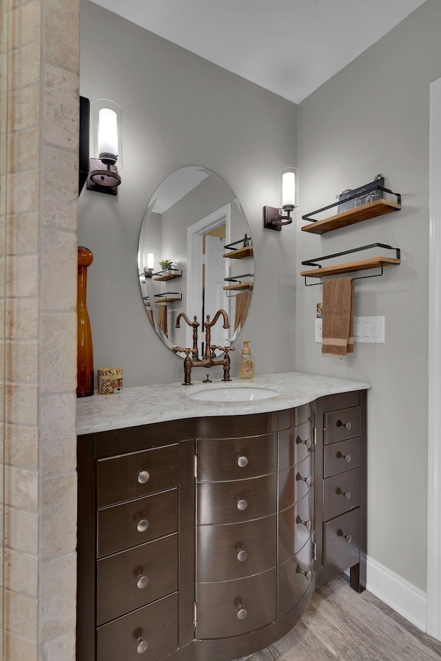 6112 Frontier Ct, Nashville, TN 37211 - bathroom featuring baseboards, wood finished floors, and vanity