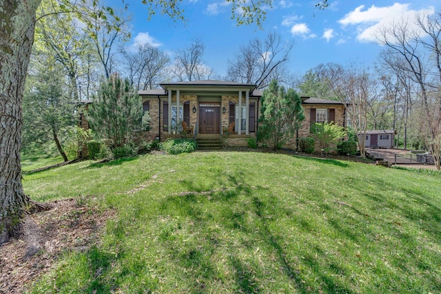 6112 Frontier Ct, Nashville, TN 37211 - view of front of house featuring brick siding, a front yard, and covered porch